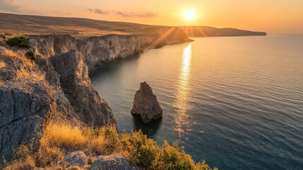 Sunrise over rugged coastline