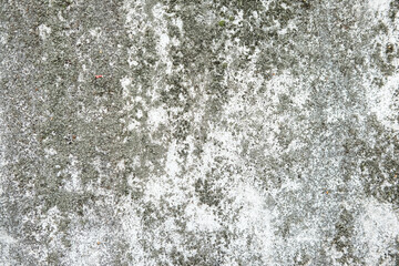 Weathered and cracked concrete wall, displaying age and texture. backgrounds or urban themes