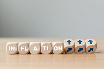 Rising Inflation Concept Represented by Wooden Blocks Spelling Inflation with Upward Arrows, Illustrating Economic Challenges and Financial Trends on a Neutral Background