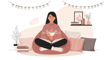 Young Woman Enjoying Cozy Time Reading a Book and Drinking Hot Beverage