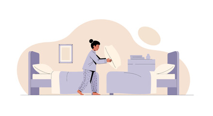 Young woman making the bed, bedroom interior, concept of home and comfort, preparing for sleep routine, morning awakening and relaxation time