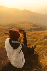 Lifestyle traveler happy feeling good relax and freedom facing in the sunrise morning. Travel Concept