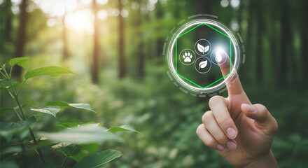 Hand touching virtual interface with ecology icons in a green forest environment background scene