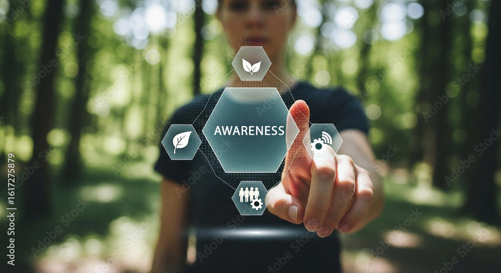 Poster a person pointing at a digital awareness interface in a forest setting with a blurred background