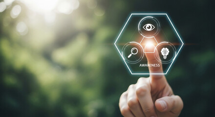 Finger touching awareness hexagon with eye, magnifying glass, and brain icons on blurred background