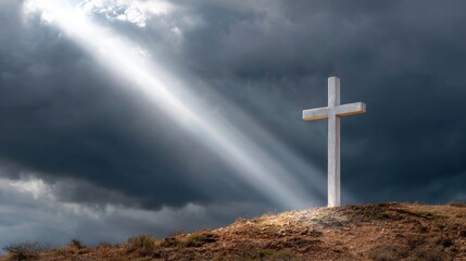 A cross stands on a hill under dramatic clouds, illuminated by a beam of light, evoking a sense of hope and spirituality.