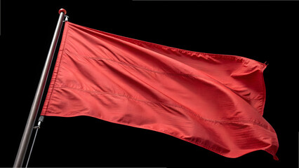 A red flag waves in the wind against a black, symbolizing freedom