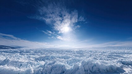 Majestic glaciers and icebergs in distance reflect bright sun under clear blue sky creating serene winter landscape