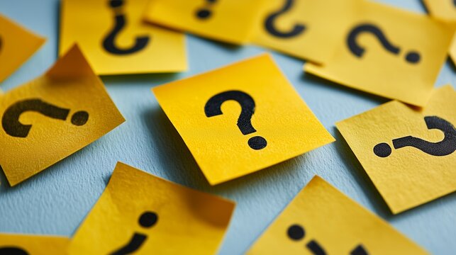 Scattered yellow sticky notes display black question marks on a blue surface, concept for problem solving, decision making and brainstorming ideas for innovation - Powered by Adobe