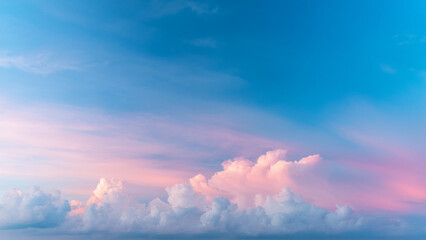 Obraz premium Surreal pastel-colored clouds floating in a digital dream sky, gradient background shifting from baby blue to soft pink. No sun, just ambient glow. Minimal dreamscape style with peaceful, whimsical fe