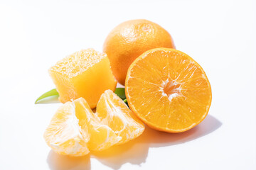 Freshly Sliced Mandarin Oranges on White Background