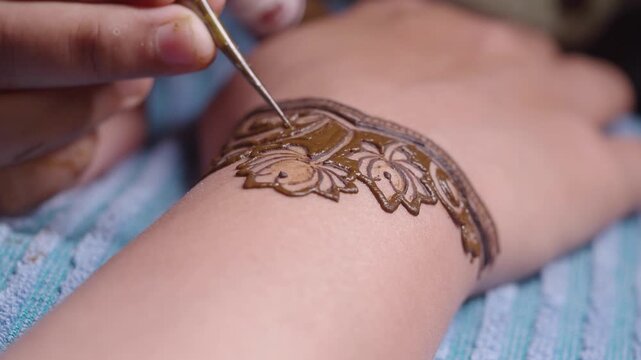 Beautiful henna design application at a cultural event