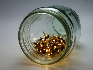 Glass jar filled with warm fairy lights