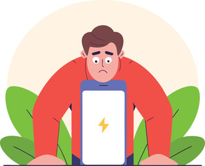 Man with worried expression looking at a low battery on his tablet