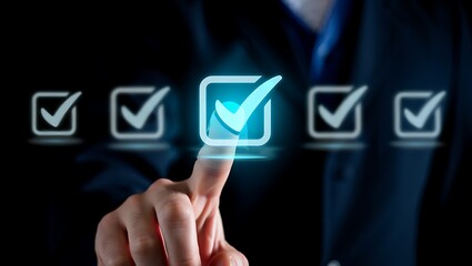 Online checklist with businessman pressing check mark icon for digital task management and project management on virtual interface technology concept