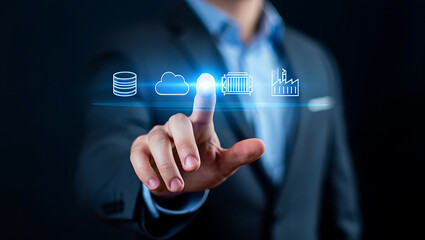 Businessman touching digital interface with industry icons image