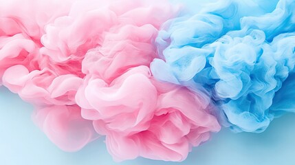 Fototapeta premium Pink and blue ink swirling in water.