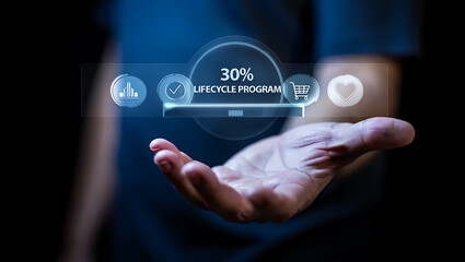 Fototapeta premium Hand holding digital interface with program details human technology