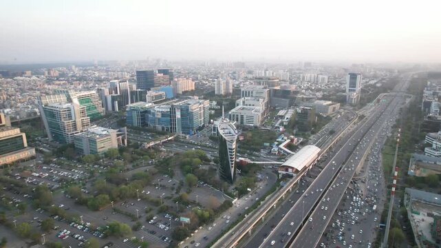 Aerial  Drone Footage of Buildings Exteriors at Cyberhub Cybercity Gurgaon Gurugram Delhi India rapid metro station