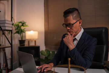 Male lawyer sitting at the legal office