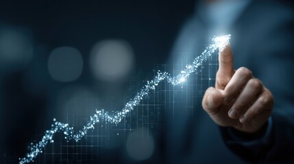 Hand showing upward graph for financial growth and data analytics