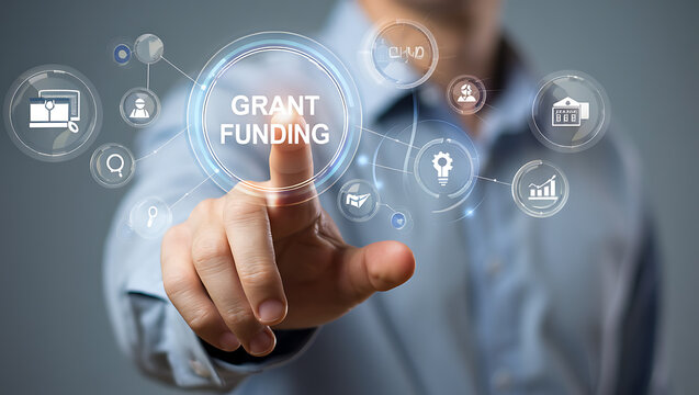 Person pointing at grant funding digital interface with icons business technology