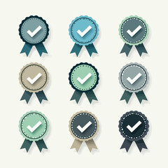 A beautiful collection of vintage-style award ribbons with check marks, a versatile icon set of quality seals and guarantee badges in various elegant colors.
