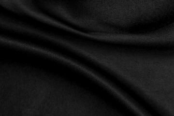 Abstract black background. Black silk satin texture background