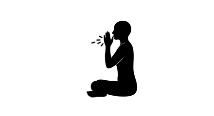Silhouette of a person meditating