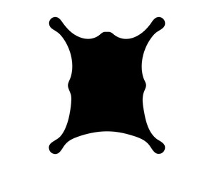 Silhouette of animal hide, suggesting a rug, pelt, or primitive garment