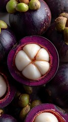 freshly opened mangosteen top-down, mangosteen with white pulp and shell, mangosteen close-up fruit detail, exotic fruit macro photography, minimalist food composition, mangosteen tropical detail shot