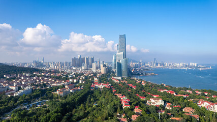 Fototapeta premium Aerial View of Coastal Cityscape with Modern Architecture
