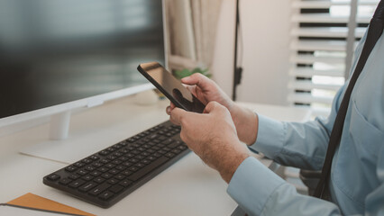 an entrepreneur is working diligently in an office, a businessman is using a smartphone to take a photo of a document, the manager is reviewing a document, marketing, company, accountant