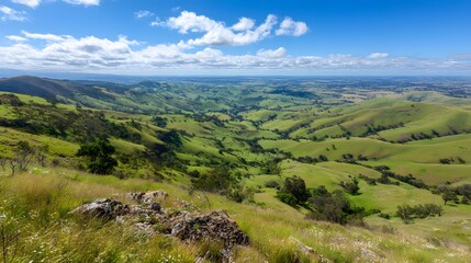 Naklejka premium Expansive view of rolling hills and valleys.