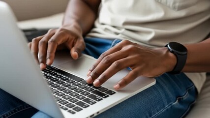 African American Male Hands Typing on Laptop Keyboard for Remote Work and Online Learning - Powered by Adobe