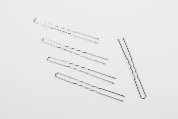 women's invisible hair clips on a white background.  taken in close-up, with a place for text or an object or advertisement