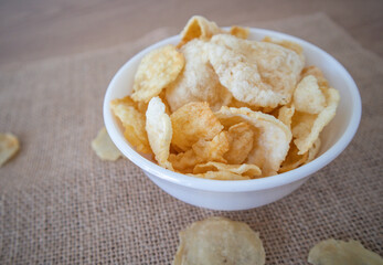 Emping is a type of Indonesian chip, a bite-size snack kripik cracker, made of melinjo or belinjo...