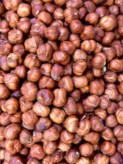 Nut background. Shelled nuts on a store shelf.