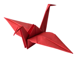 Vibrant red origami crane against a stark black background