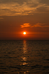 view of the sunset over the sea at the island