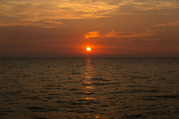 view of the sunset over the sea at the island