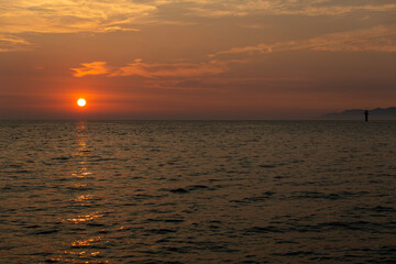 view of the sunset over the sea at the island