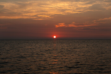 view of the sunset over the sea at the island
