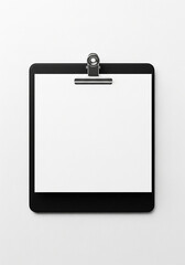 Sleek black clipboard with a blank white sheet for your text or design. Isolated on a clean white background, this versatile mockup is perfect for business, office, or educational concepts.