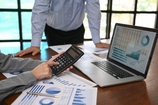 accountant team review accounts report and using digital accounting program software on computer for working accounting standards system at office.	