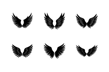 spread pair of angel or eagle wings silhouette vector art