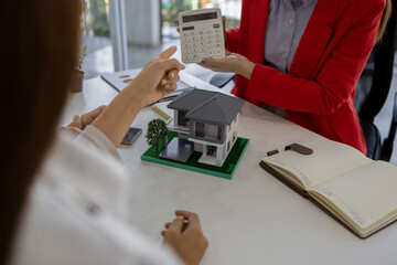 concept for selling a house and home insurance. Signing a house purchase and sale agreement, housing rental, mortgage, real estate, rent, selling, loan, property, agent