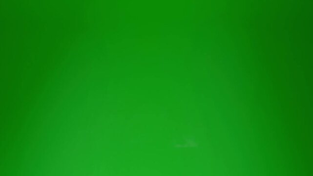 4K Sparks hits  and smoke explosion on chroma key Background. Spark Wall created by Gun Powder Sparks Falling. Slow Motion. Welding Sparks On green screen background