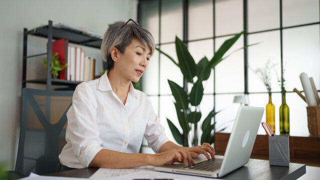 Senior business asian woman architect engineer