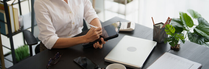 Senior business asian woman mature working in office